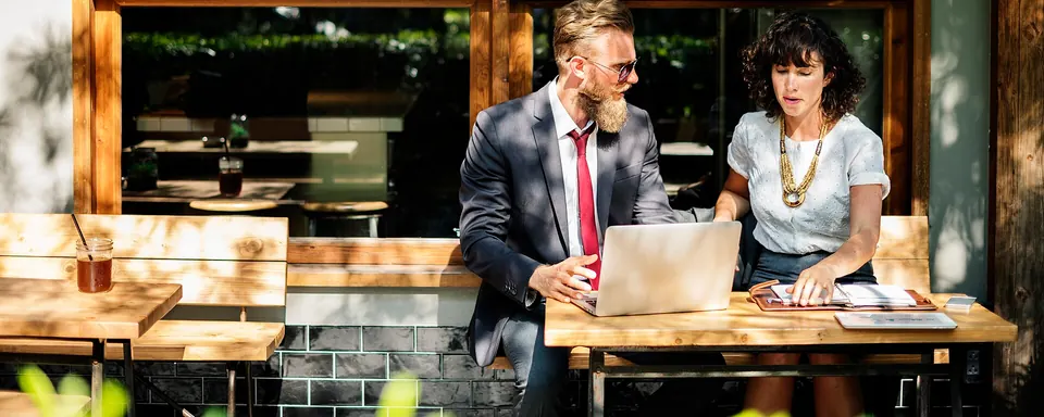 Two people in a business meeting