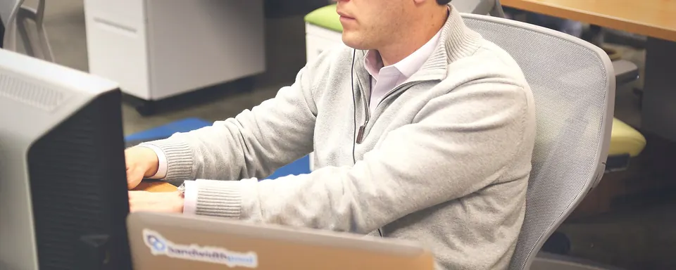 Person at a desk in a coworking space