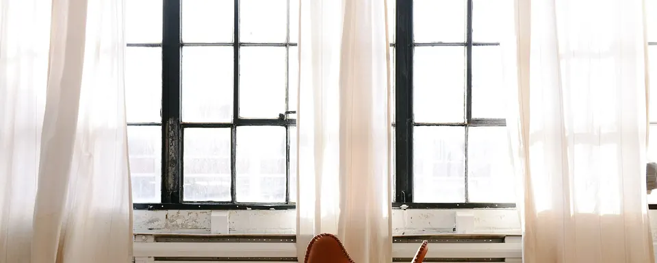 Loft interior with tall windows