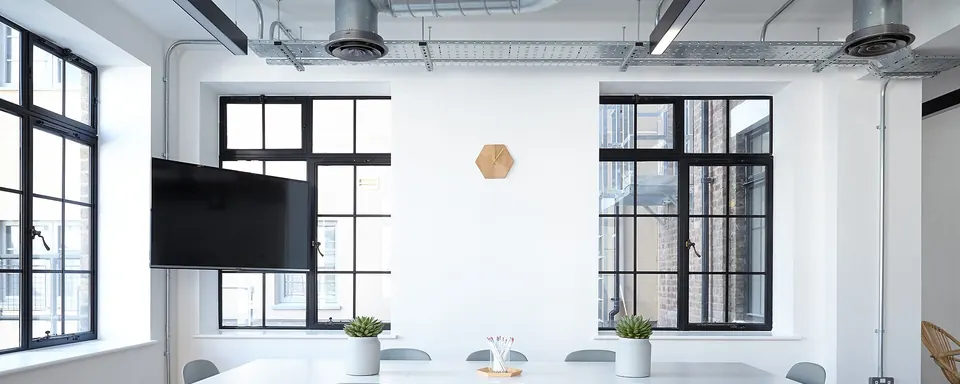 Neat conference room with a white table